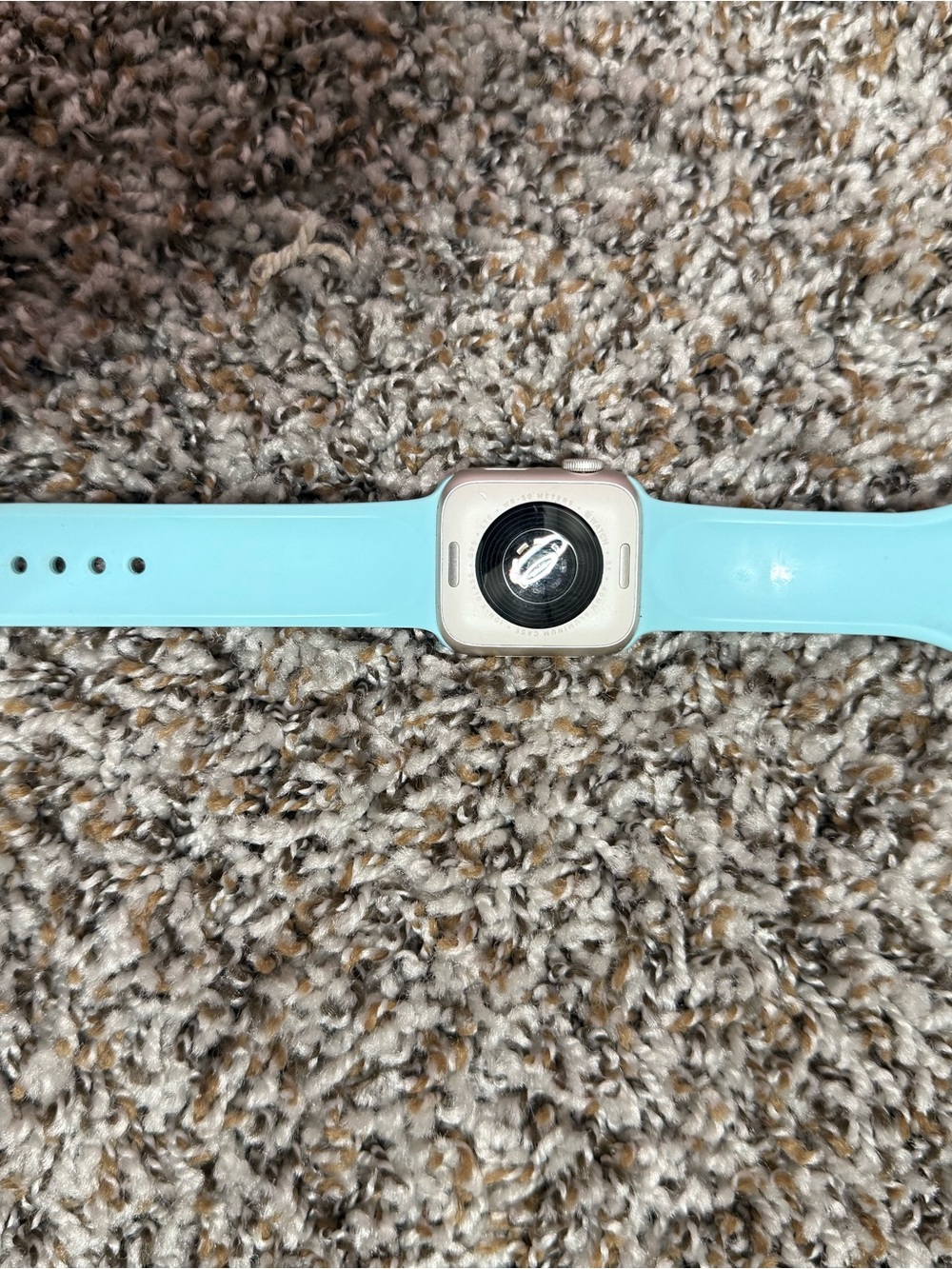 Apple Smartwatch with Aqua Silicone Band and Silver Case